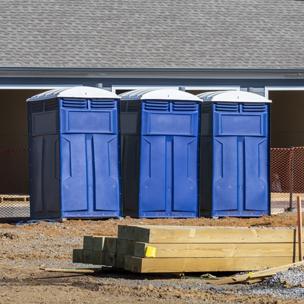 what is the cost difference between standard and deluxe portable restroom rentals in Glenwood NM